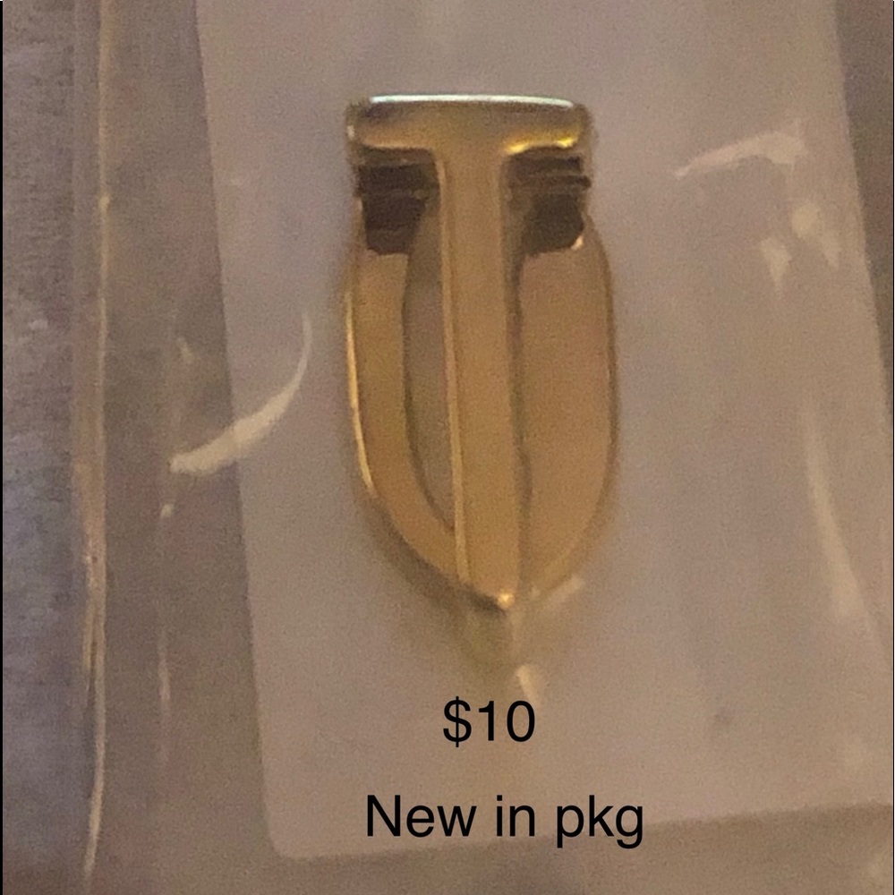 KEEP Collective retired gold letter T.